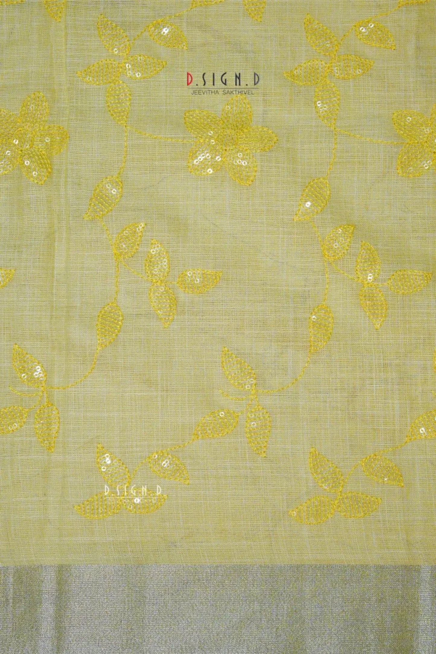 PASTEL YELLOW SEQUIN FLORAL LINEN SAREE.