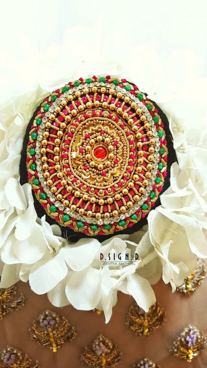 Red beaded Rakodi